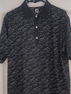 FootJoy Black Golf Polo with White Wave Pattern ⛳